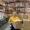 Volunteer holding up a box of food at the Distribution Center
